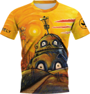 A yellow disc golf jersey with an illustration of a stylized, cartoonish character and a sunset background, designed by Scott Stokely.